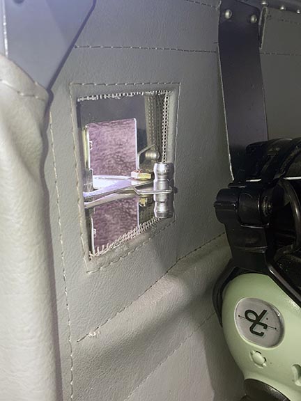 left vent door handle in open position